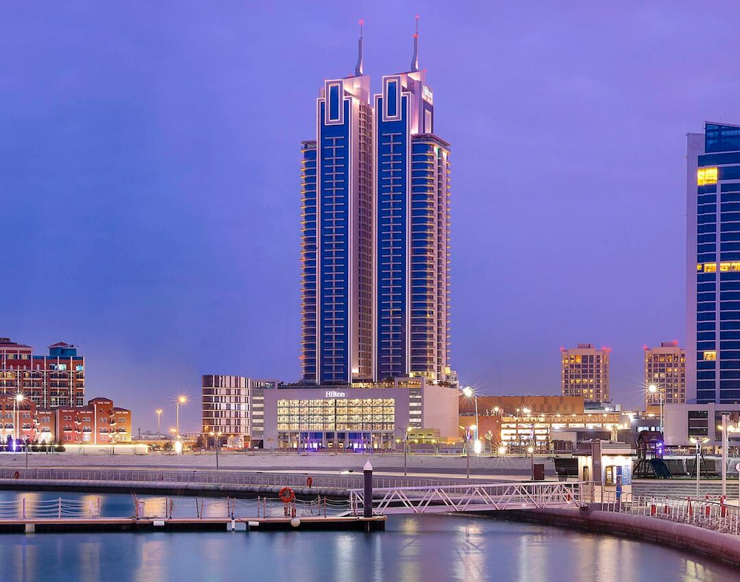 Hilton Bahrain City Centre Hotel and Residences seen across the water